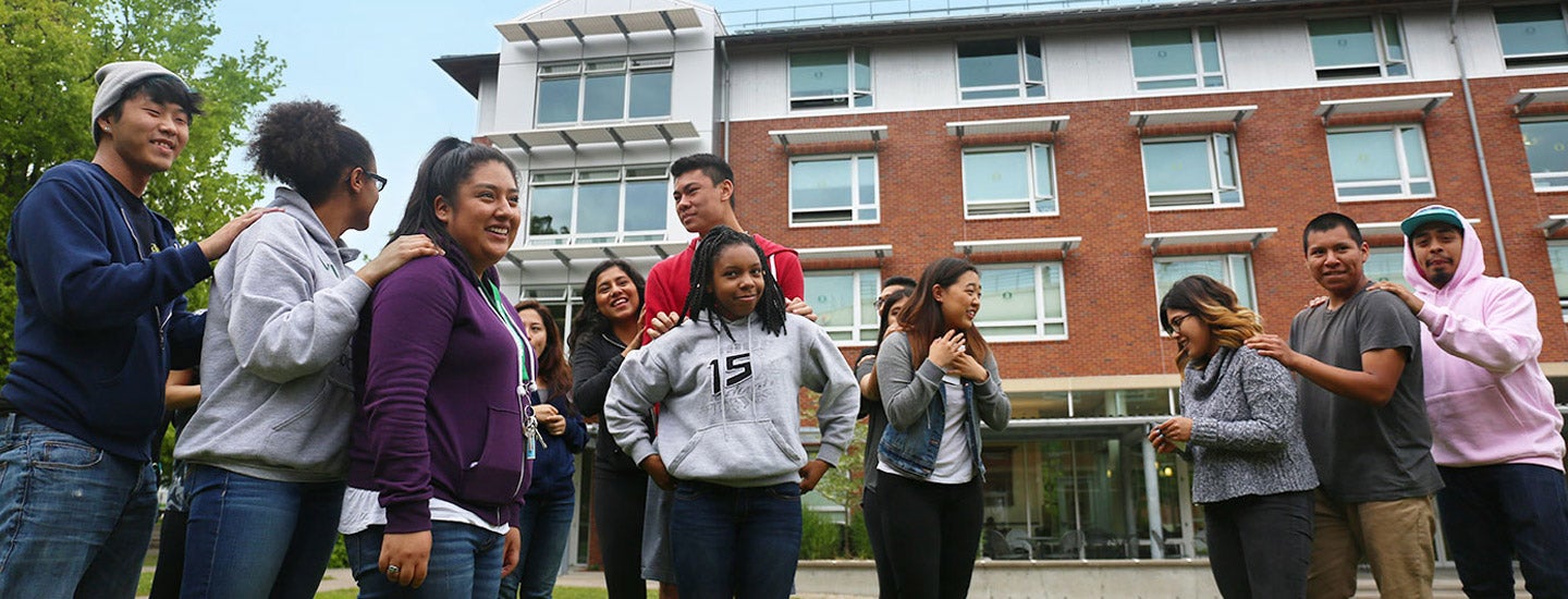 IMPACT students playing a game on the Living-Learning Center lawn.